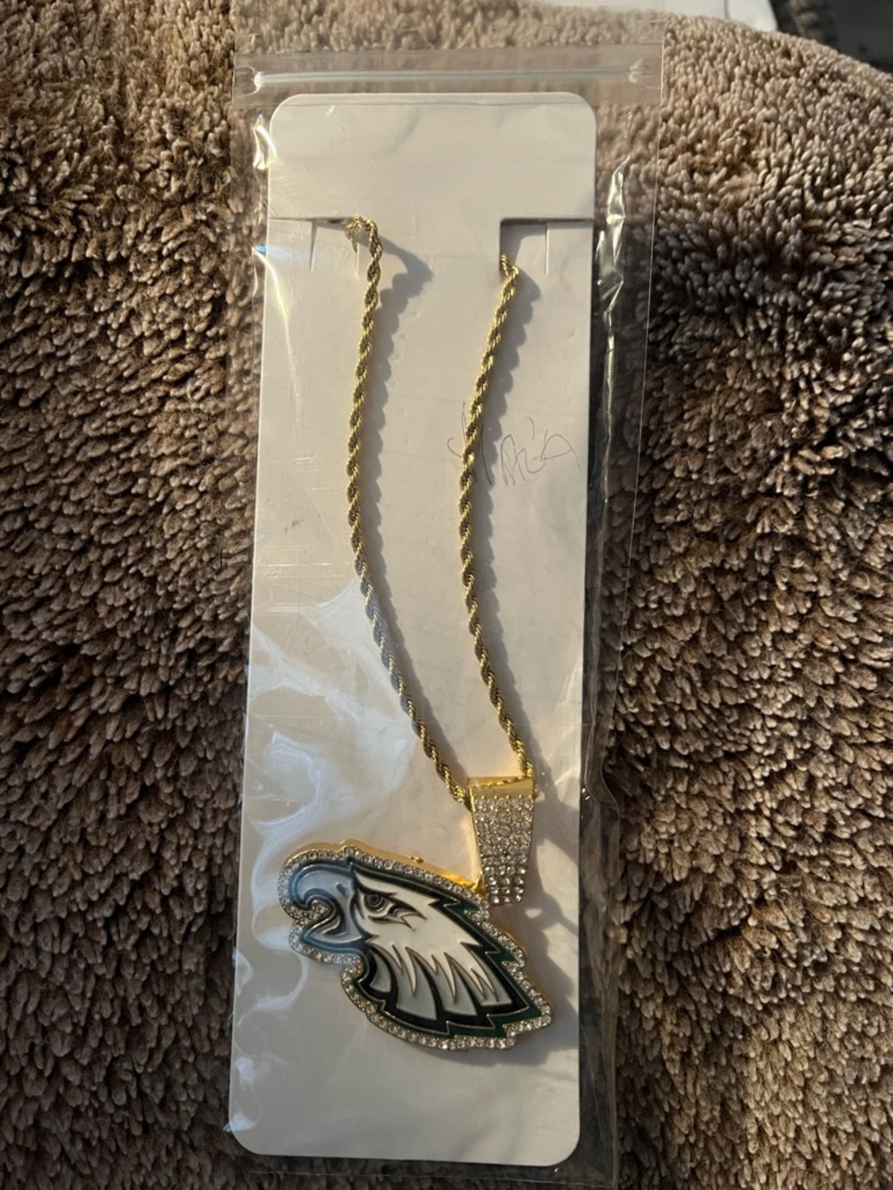 Eagles necklace . New in package